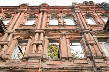 Facade of an ancient dilapidated building