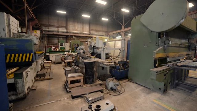 Metalworking shop. Guillotine shears, grinding machines