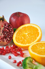 Navel Orange with Pomegranate and Red Apple
