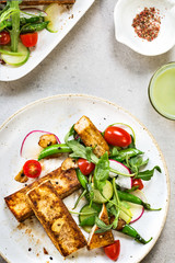 Tofu steak with Snow Peas and Rocket Salad
