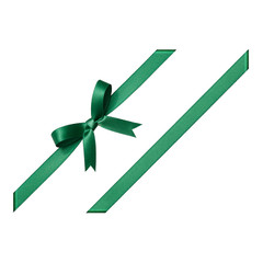 Green bow tied using silk ribbon, cut out top view, corner