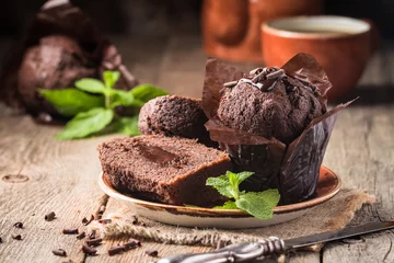 Foto auf Acrylglas Homemade chocolate muffins © petrrgoskov