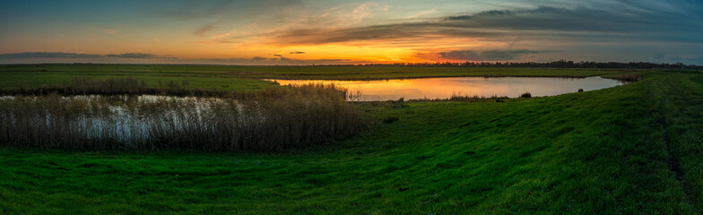 Fototapeta na wymiar Lake in the sunset