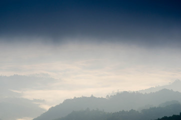 Fototapeta premium Beautiful foggy morning in the mountains in Thailand