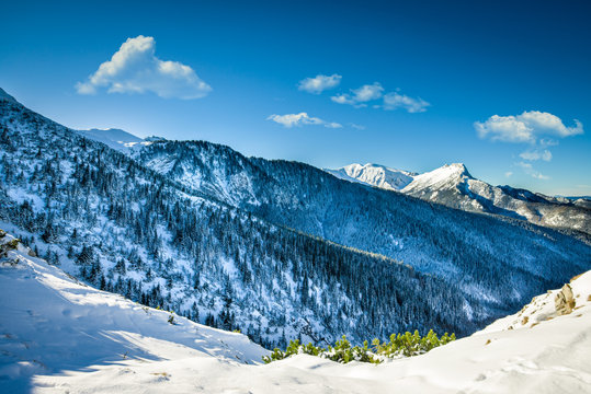 Mountain peak Giewont from between hillocks defile, Mountain peak Giewont from Boczan winter, Tatra mountains, Poland