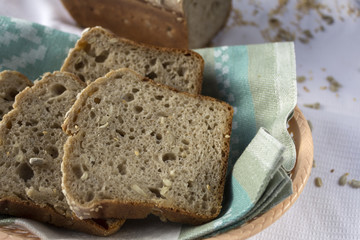 Slices of homemade bread without gluten, with sesame seed and sunflower