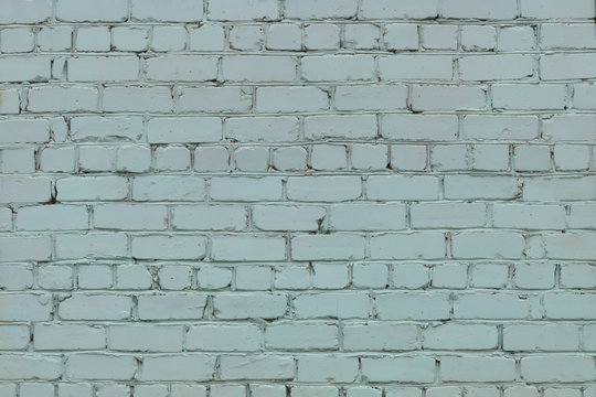 Light Blue Brick Wall Background In Rural Area.