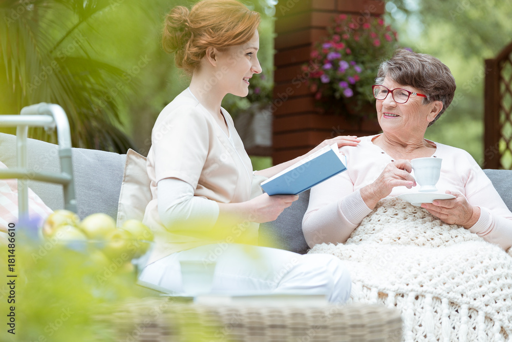 Canvas Prints senior drinking tea in garden