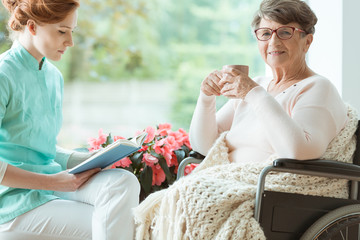 Pensioner on wheelchair sick on osteoporosis