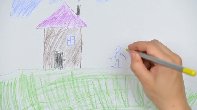 child drawing house and family