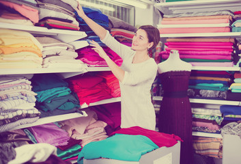 Woman choosing fabric