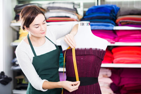 Tailor Working At Dress