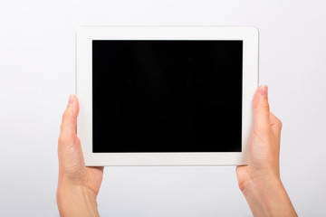 Tablet and Hands on White Background