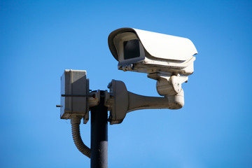 Security camera on sky background