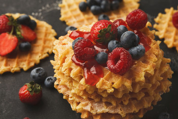 Round belgium waffles with berries