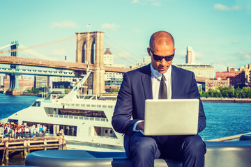 European Businessman with shaved head travels, works in New York