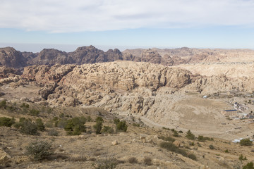 Surroundings of Petra with the Dam and the entrance of the Siq in the foreground, Jordan