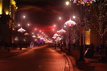 Fototapeta premium Panorama of Warsaw at night - view of Nowy Swiat street in Christmas decorations