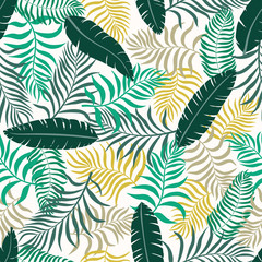 Tropical background with palm leaves. Seamless floral pattern with banana leaves