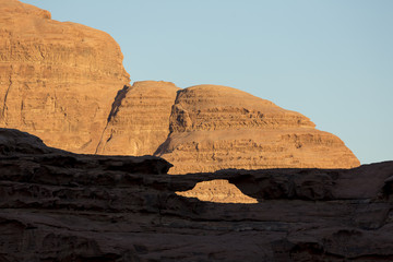 Wadi Rum (The Moon Valley) desert landscape at sunset time, Jordan