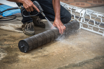 Cleaning air conditioner by water for clean a dust