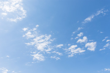 Naklejka na ściany i meble A blue sky with white clouds in a nice weather day