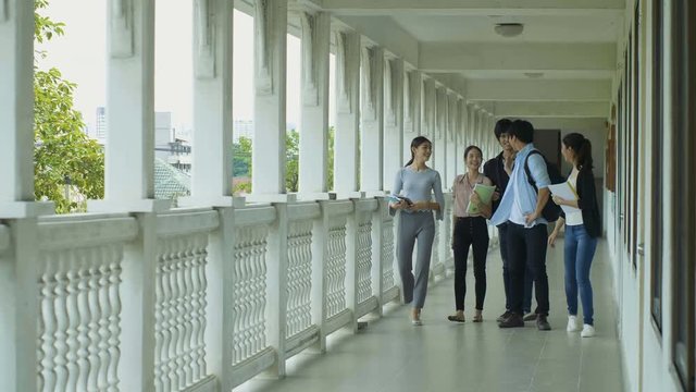 Asian College students are chatting after finish class 