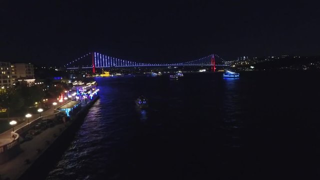 Istanbul Bosphorus Bridge Drone Night Aerial View Video - istanbul Bogazi&ccedil;i K&ouml;pr&uuml;s&uuml; 15 Temmuz sehitler K&ouml;pr&uuml;s&uuml; Besiktas Dolmabah&ccedil;e Ortak&ouml;y Bogazi&ccedil;i K&ouml;pr&uuml;s&uuml; Gece &Ccedil;ekimi