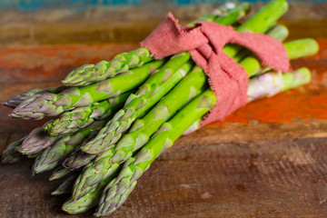 Green young asparagus shoots – premium healtry food, ready to cook and for grill