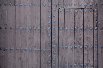 Part of old wood door with locks