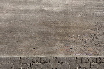 Texture of a Old wall from a stone brick of brown color