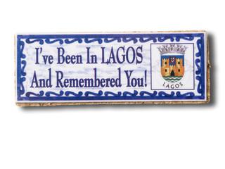 Lagos (Portugal) souvenir refrigerator magnet isolated on white. Refrigerator magnets are popular souvenir and collectible objects. 
