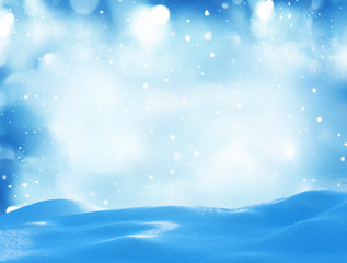 Winter background with snow and blurred bokeh.Merry Christmas and happy New Year greeting card with copy-space