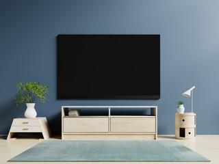 Tv in modern empty room and dark wall background. 3d rendering