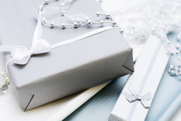 Gift boxes with jewelry presents for women. Tasteful and elegant surprise concept