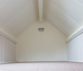 Empty attic room interior