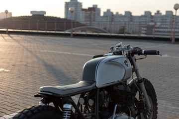 Vintage custom motorcycle on parking