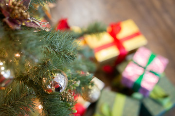 Defocused Christmas presents under a tree