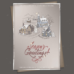 Vintage color A4 format Christmas card with mountain village and holiday brush lettering