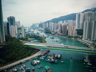 Aerial Top View of The Aberdeen Bay and the buildings on two sides of the harbour in Hong Kong.