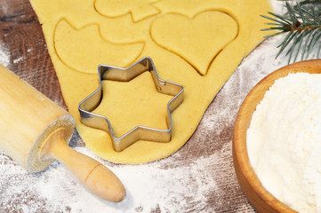 Gingerbread cookies making. Christmas baking concept.
