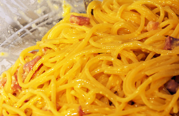 spaghetti alla carbonara with bacon, eggs, and pepper