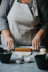Woman working with dough  