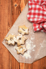 Tea cookies on wooden background. Homemade pastry concept.