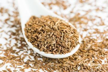 cumin on white background.Selective focus