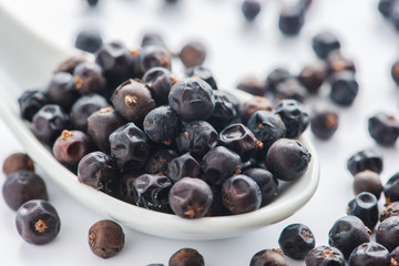 Juniper Berries on white background.Selective Focus.