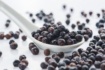 Juniper Berries on white background.Selective Focus.