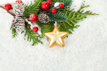 White Snow Background with Green Christmas Tree, Golden Star and Red Berries for Christmas Card