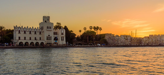 Naklejka premium Kos fortress and the municipal building at sunset, Kos town, Kos island, Dodecanese, Greece