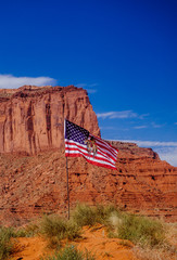 Monument Valley and the Navajo flag. History of the USA